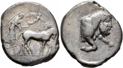 SICILY. Gela. Circa 450-440 BC. Tetradrachm (Silver, 23 mm, 16.63 g, 1 h). Charioteer driving quadriga moving slowly to the right; above, Nike flying ...