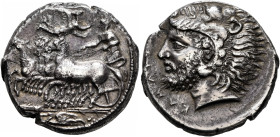 SICILY. Kamarina. Circa 415-400 BC. Tetradrachm (Silver, 25 mm, 16.20 g, 6 h). Charioteer driving quadriga galloping to left, holding the reins with h...