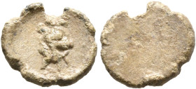 ASIA MINOR. Uncertain. 2nd-3rd centuries. Tessera (Lead, 11 mm, 1.11 g). Head of a boar or lion to right (?). Rev. Blank. Apparently unpublished. Irre...