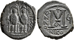 Justin II, with Sophia, 565-578. Follis (Bronze, 28 mm, 12.34 g, 6 h), Nicomedia, RY 5 = 570/1. [D N IVSTI]NVS P P AVG Justin II, holding globus cruci...