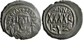 Phocas, 602-610. Follis (Bronze, 29 mm, 9.69 g, 6 h), Cyzicus, RY 6 = 607/8. δ N FOCAS PERP AVG Crowned bust of Phocas facing, wearing consular robes,...