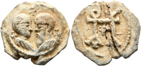 Paulos, circa 6th century. Seal (Lead, 22 mm, 8.12 g, 12 h). Confronted draped busts of Saints Peter and Paul, surrounded by crosses. Rev. Large block...