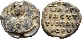 Johannes, logariastes of the Tropaiophoros (St. George), last third of 11th century. Seal (Lead, 20 mm, 6.80 g, 12 h). [MHP] - ΘV Nimbate bust of the ...