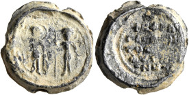 Leon Phyteianos, 11th century. Seal (Lead, 20 mm, 8.56 g, 12 h). Two nimbate military saints (most likely Theodoros and Georgios) standing facing, hol...