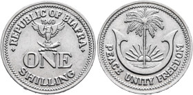 BIAFRA. Republic. 1967-1970. Shilling 1969 (Aluminum, 23 mm, 1.69 g, 12 h). REPUBLIC OF BIAFRA / 1969 / ONE / SHILLING Eagle with spread wings on elep...