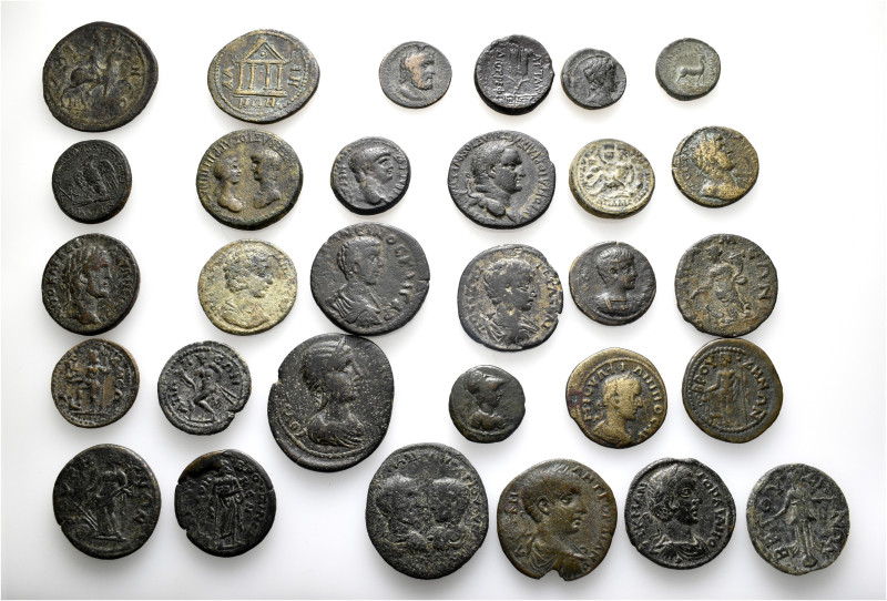 A lot containing 30 bronze coins. Including: Greek and Roman Provincial coins fr...