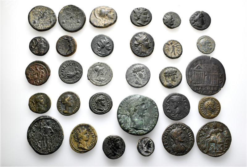 A lot containing 30 bronze coins. Including: Greek and Roman Provincial coins fr...