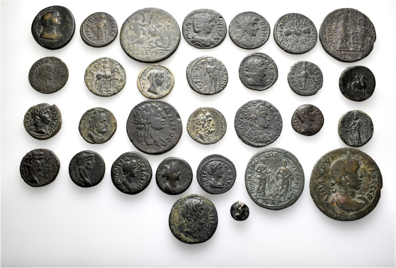 A lot containing 30 bronze coins. Including: Greek and Roman Provincial coins fr...