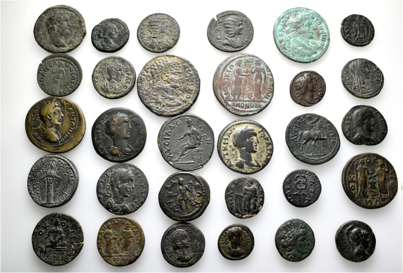 A lot containing 30 bronze coins. Including: Greek and Roman Provincial coins fr...