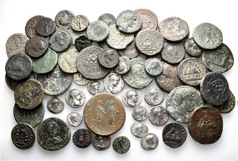 A lot containing 64 silver and bronze coins. All: Roman Provincial. Fine to very...