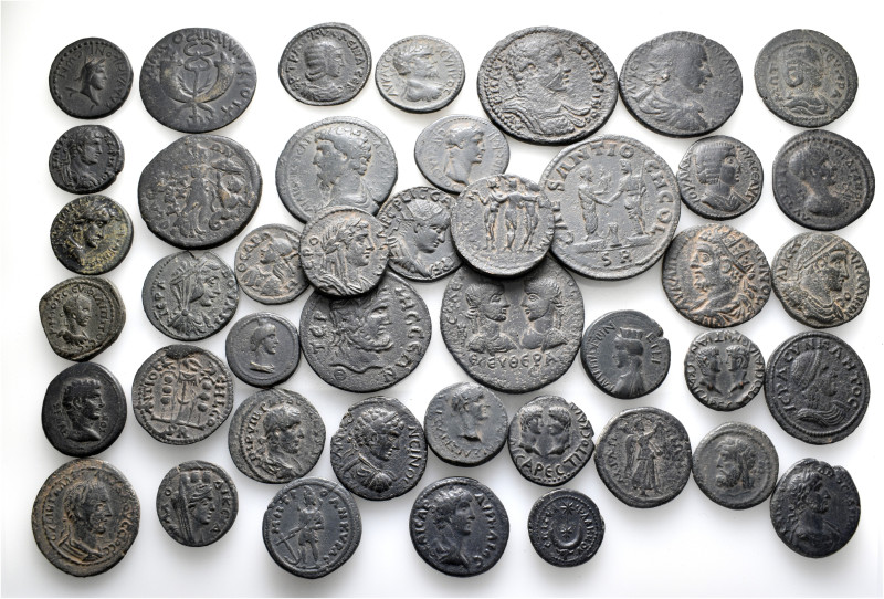 A lot containing 43 bronze coins. Including: Roman Provincial. Fine to very fine...