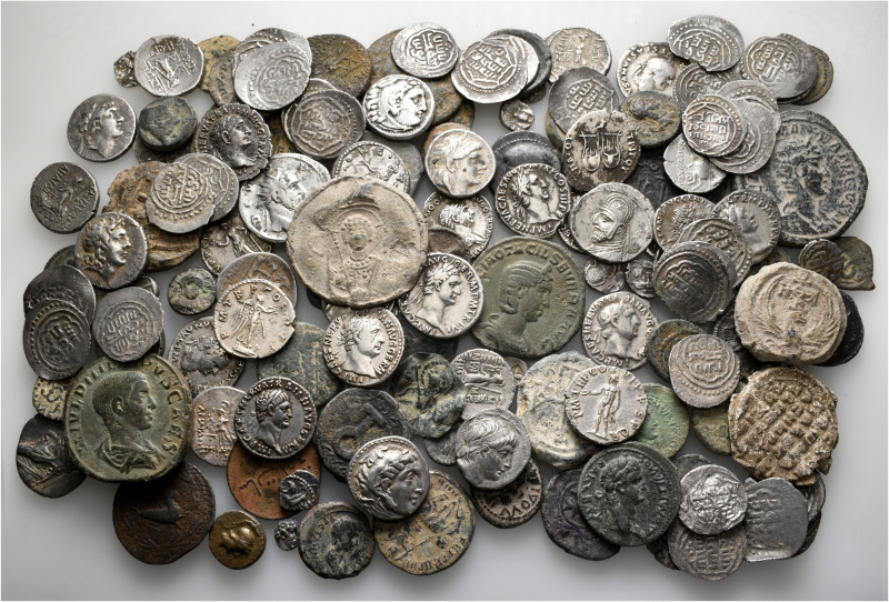 A lot containing 120 silver and bronze coins. Including: Greek, Roman Provincial...