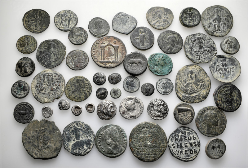 A lot containing 48 silver and bronze coins. Including: Greek, Roman Provincial,...