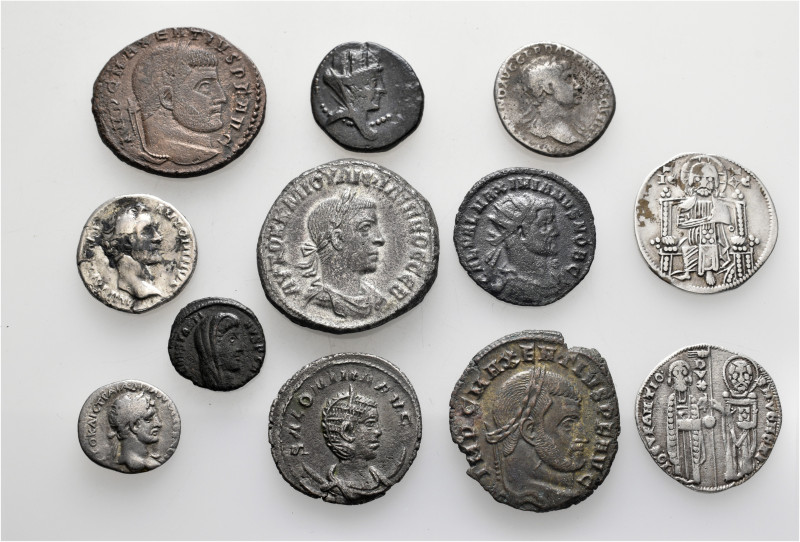 A lot containing 7 silver and 5 bronze coins. Including: Greek, Roman Provincial...