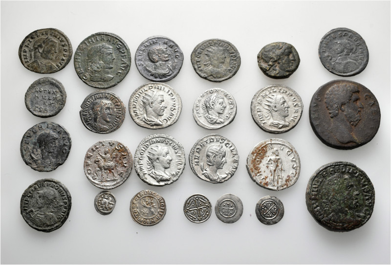 A lot containing 24 silver and bronze coins. Including: Greek, Roman Provincial,...