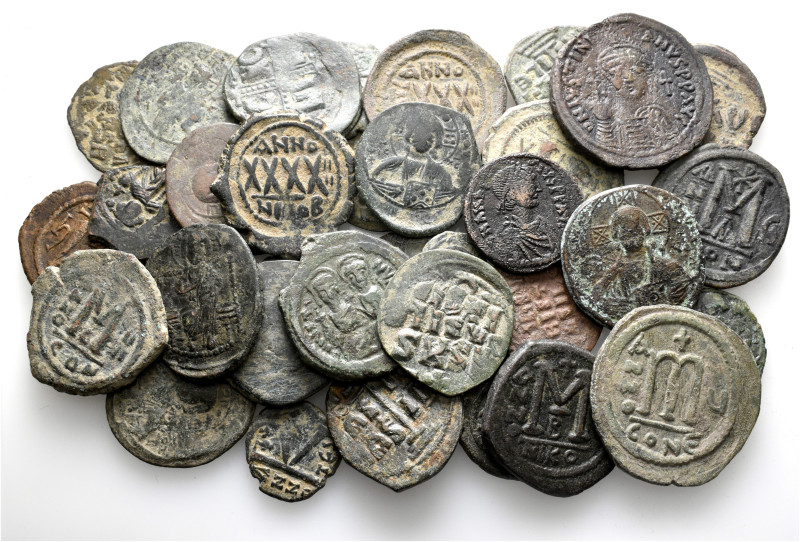 A lot containing 39 bronze coins. All: Byzantine. Fair to very fine. LOT SOLD AS...