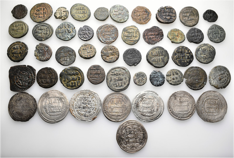 A lot containing 8 silver and 39 bronze coins. All: Islamic (Abbasid Caliphate)....