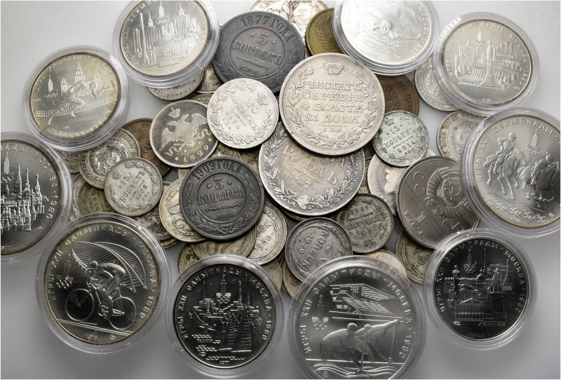 A lot containing 61 mainly silver coins (546 g). Mainly: Soviet Union and Russia...