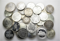 A lot containing 35 silver coins (607 g). Including: Austria, Switzerland and USA. Very fine to good extremely fine. LOT SOLD AS IS, NO RETURNS. 35 co...