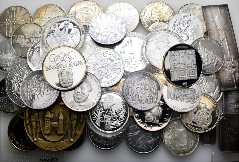 A lot containing 45 silver, copper-nickel and bronze medals and 3 silver bars. M...