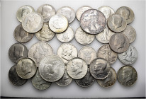 A lot containing 32 silver and copper-nickel coins (437 g). All: United States of America, mostly Half Dollars. About very fine to extremely fine. LOT...