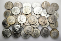 A lot containing 35 silver and copper-nickel coins (408 g). All: United States of America Half Dollars. About very fine to good very fine. LOT SOLD AS...