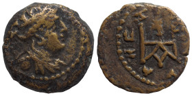 BABYLONIA. Seleukeia ad Tigrim. Circa first century AD. Ae (bronze, 2.17 g, 15 mm). Turreted bust of Tyche to right. Rev. Monogram; BOVΛHC (?) around,...