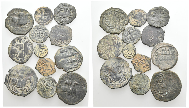 12 ISLAMIC BRONZE COIN LOT
See picture. No return.

348