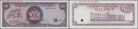 Trinidad & Tobago: 20 Dollars 1977 Specimen P. 33s with red ”Specimen” overprint at right, one cancellation hole and zero serial numbers. The note is ...