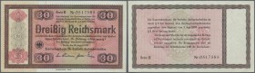 Reichskonversionskasse: 30 Reichsmark 1934, mit Heftlöchern, ohne Perforation, Ro.710 mit rostigen Spuren einer Büroklammer und Knick rechts oben. Erh...