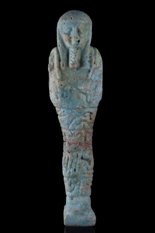 ANCIENT EGYPTIAN FAIENCE USHABTI
Late Dynastic Period, Ca. 664-332 BC. A mummif...