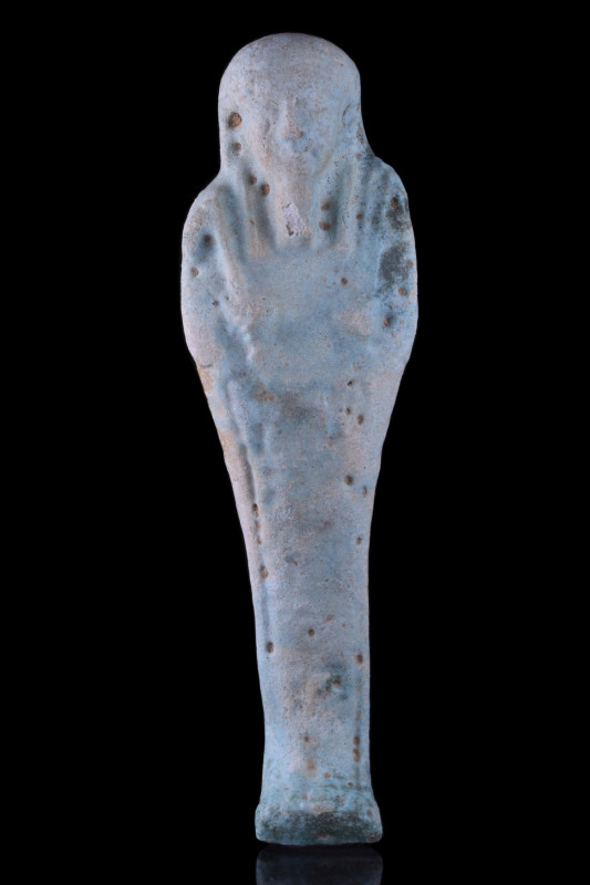 ANCIENT EGYPTIAN FAIENCE USHABTI
Late Dynastic Period, Ca. 664-332 BC. An ancie...