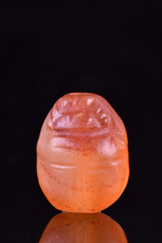 ANCIENT EGYPTIAN CARNELIAN SCARAB
Ca. 664-332 BC. A carnelian scarab with an ov...