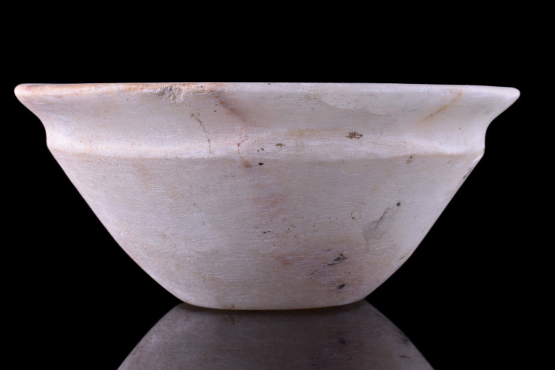 BACTRIAN ALABASTER BOWL
Ca. 3100-2500 BC. A fine Bactrian alabaster bowl, featu...
