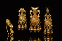 COLLECTION OF FOUR HELLENISTIC GOLD EARRINGS