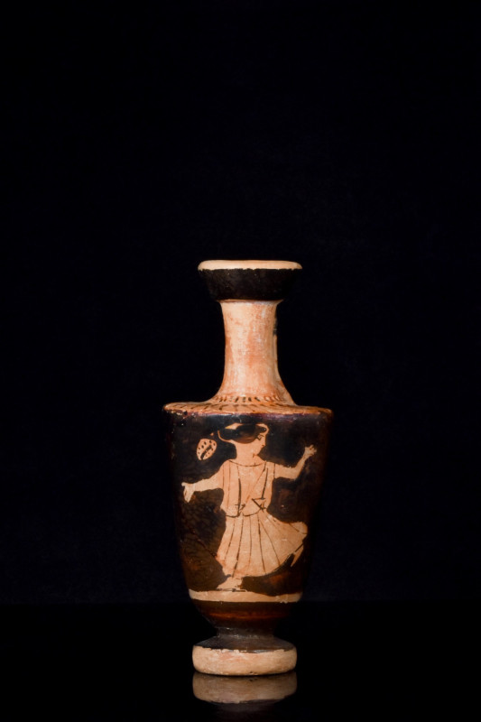 GREEK ATTIC RED FIGURE POTTERY LEKYTHOS WITH DANCING WOMAN
Ca. 600-500 BC. A wh...