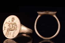 GREEK GOLD SEAL RING WITH SEATED GODDESS