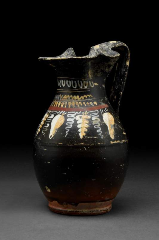 GREEK GNATHIAN TERRACOTTA OINOCHOE WITH DECORATION
Ca. 340-320 BC. An attractiv...
