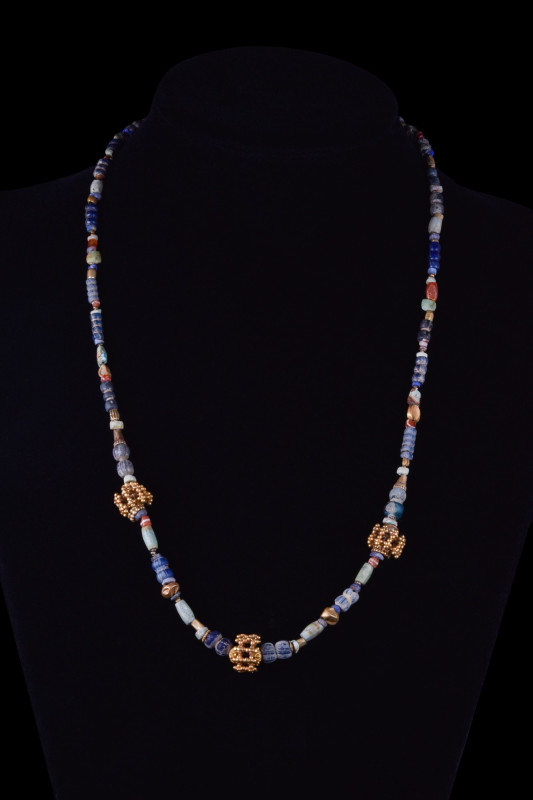 HELLENISTIC GOLD AND LAPIS LAZULI NECKLACE
Ca. 400-300 BC. A necklace composed ...