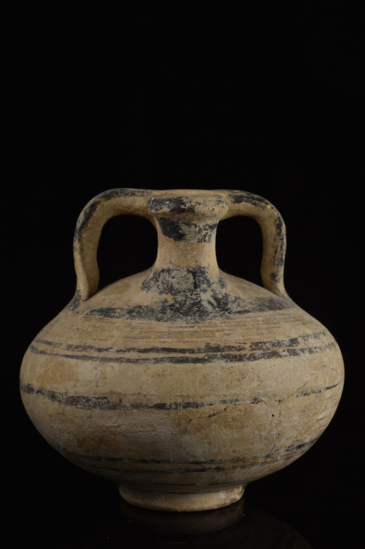 MYCENAEAN TERRACOTTA STIRRUP JAR
Ca. 1300-1100 BC. A cream-coloured pottery sti...