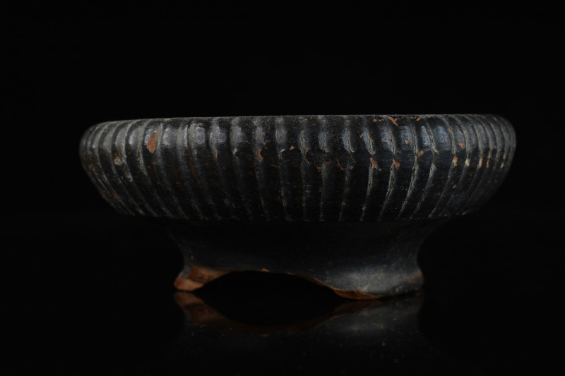 ATTIC BLACK-GLAZED SALT CELLAR / SMALL BOWL
Ca.350 BC. A black-glazed terracott...