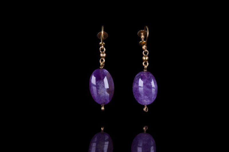 ROMAN AMETHYST STONE GOLD EARRINGS
Ca. 100-300 AD. A delicate pair of gold earr...