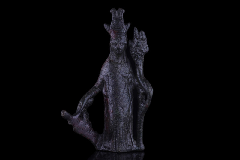 ROMAN BRONZE FIGURE OF ISIS-FORTUNA
Ca. 1-100 AD. A cast bronze statuette demon...