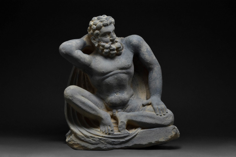 GANDHARAN SCHIST STATUE KNEELING TELAMON INSPIRED BY ATLAS
Ca. 200-300 AD. A fi...