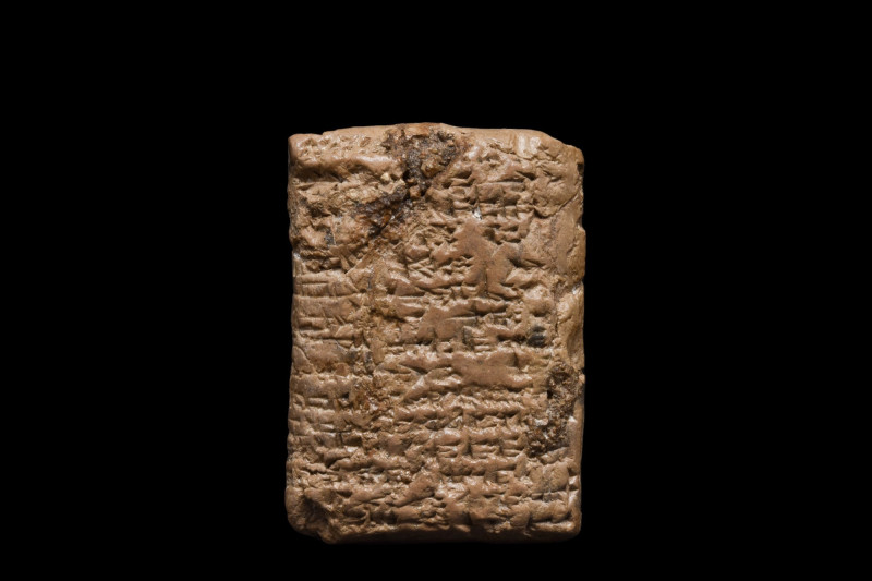 MESOPOTAMIAN CLAY CUNEIFORM TABLET
Ca. 1900-1700 BC. A rectangular cuneiform ma...