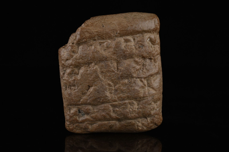 MESOPOTAMIAN CLAY CUNEIFORM TABLET
Ca. 1900-1700 BC. A rectangular-section cera...