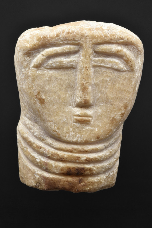 SOUTH ARABIAN ALABASTER HEAD
Ca. 1st millennium BC. A hand-carved alabaster hea...