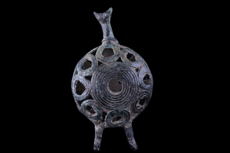 WESTERN ASIATIC BRONZE OPENWORK PENDANT FIGURE
Ca. 1st millennium BC. A highly ...