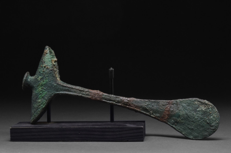 WESTERN ASIATIC BRONZE RITUAL AXE
Elamite, Ca. 1100-540 BC. A bronze flat axe w...