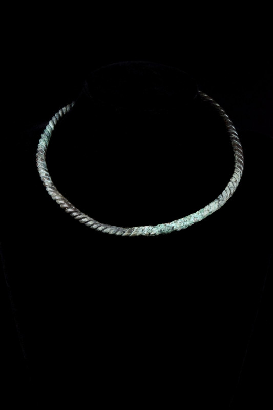 VIKING BRONZE TWISTED NECK TORC
Ca. 700-900 AD. A beautiful, solid neck torc co...